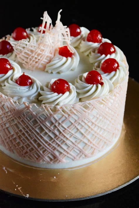 Eggless White Forest Cake Video Recipe – Gayathri's Cook Spot.